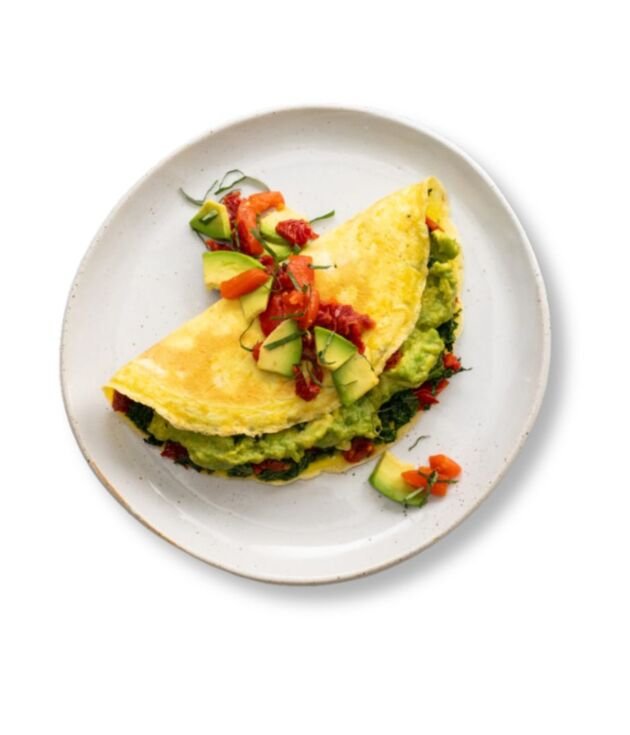 Avocado Omelette with eggs, cheese, and fresh avocado slices at NY Diner Boston in Brighton MA