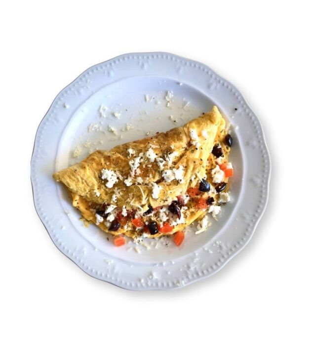 Greek Omelette with feta cheese, spinach, and tomatoes at NY Diner Boston in Brighton MA