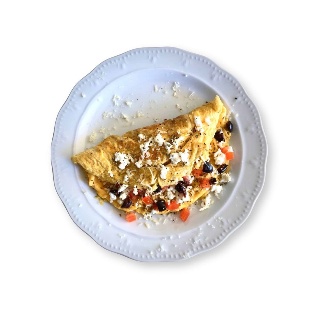 Greek Omelette with feta cheese, spinach, and tomatoes at NY Diner Boston in Brighton MA