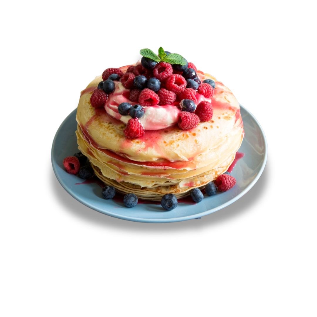 Berry Pancakes topped with fresh strawberries and blueberries at NY Diner Boston in Brighton MA