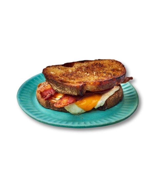 Breakfast Melt sandwich with eggs, bacon, and melted cheese at NY Diner Boston in Brighton MA