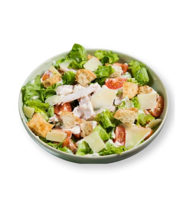 Classic Caesar Crisp Salad with romaine and parmesan at NY Diner Boston in Brighton MA