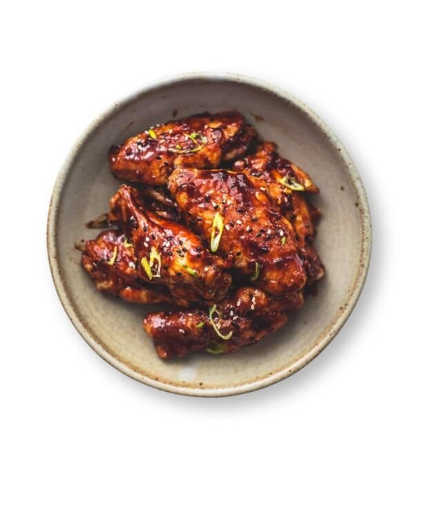 Korean BBQ Chicken Wings glazed in sweet and smoky sauce at NY Diner Boston in Brighton MA