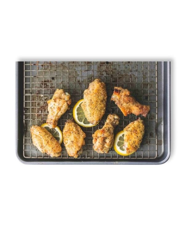 Lemon Pepper Chicken Wings tossed in zesty seasoning at NY Diner Boston in Brighton MA