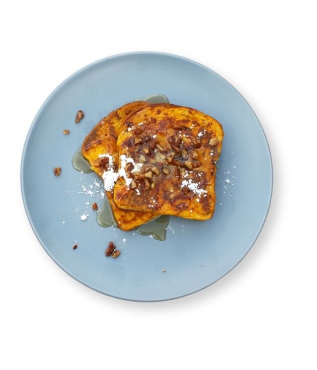 Pumpkin Pecan French Toast topped with nuts and syrup at NY Diner Boston in Brighton MA